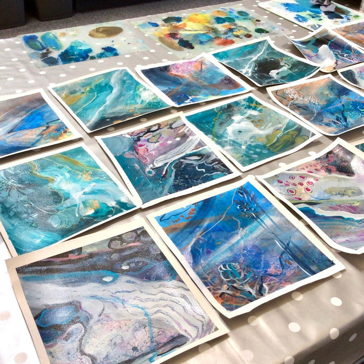 expressive abstract paintings on a table